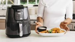 Praticidade da airfryer permitindo preparar refeições saudáveis mesmo em rotinas agitadas Praticidade da airfryer permitindo preparar refeições saudáveis mesmo em rotinas agitadas