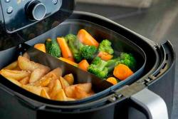 Demonstração da praticidade e rapidez da airfryer no preparo de refeições saudáveis Demonstração da praticidade e rapidez da airfryer no preparo de refeições saudáveis